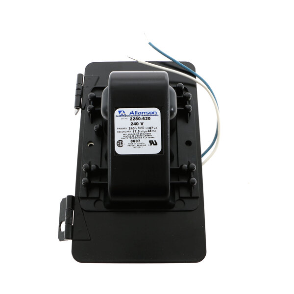 A close up of a black Eloma Ignition Transformer with a white label.