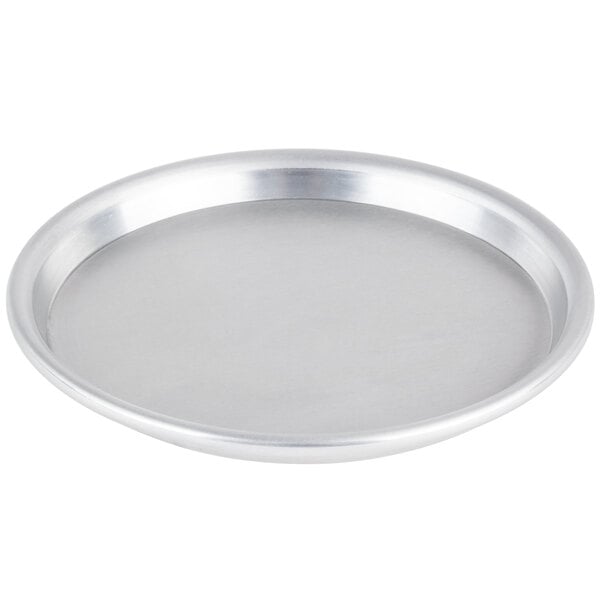 An American Metalcraft silver aluminum pizza pan.
