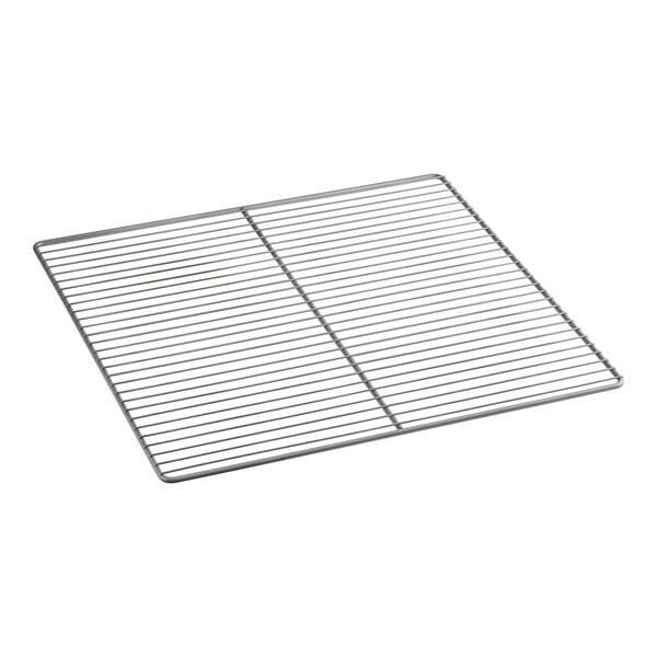 A Traulsen metal shelf with a grid on it.