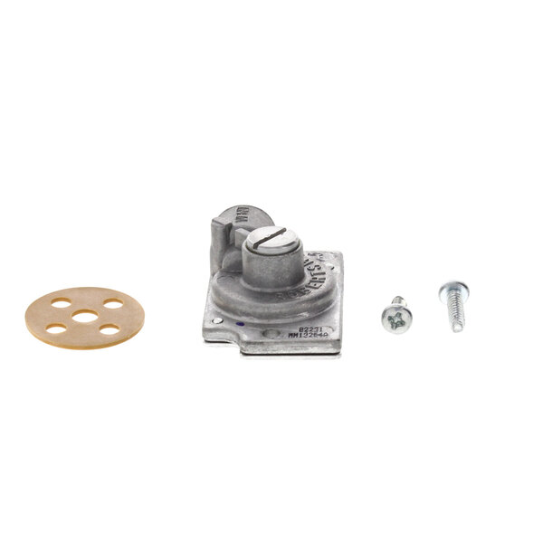 A metal plate with a round object and screws.
