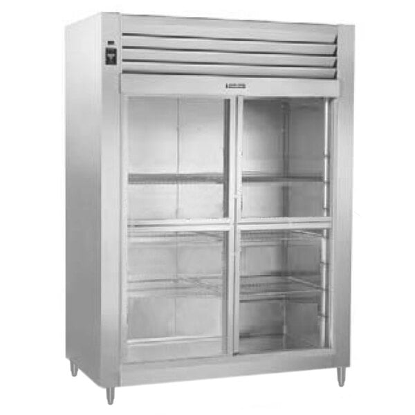 A Traulsen stainless steel reach-in refrigerator with glass half doors.