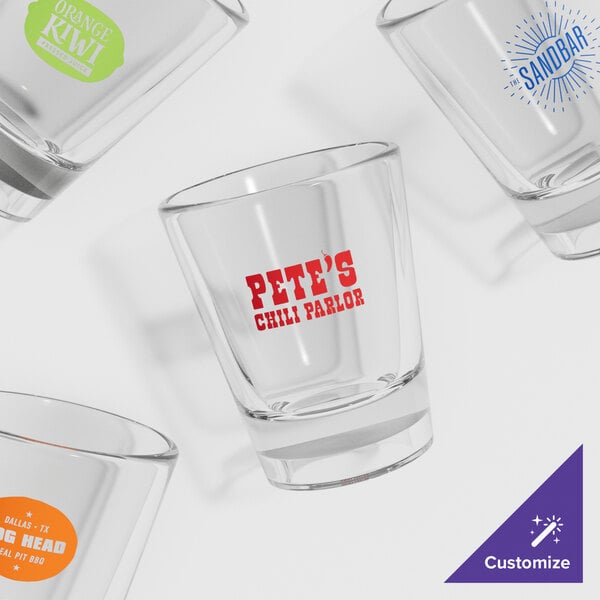 A customizable SAN plastic shot glass with a clear label.