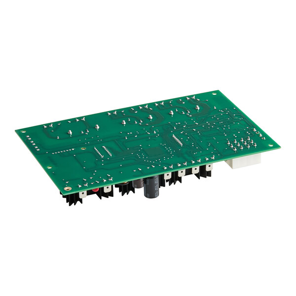 A green Hatco control board with many small chips and holes.