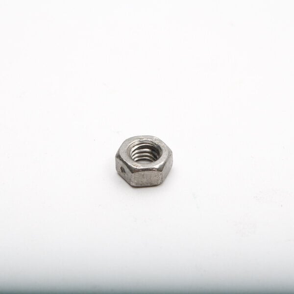 A close up of a Berkel nut on a white surface.