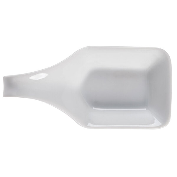 a white plate with a fork