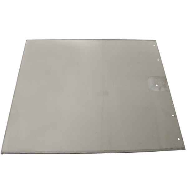 A white rectangular metal sheet with a hole in it.