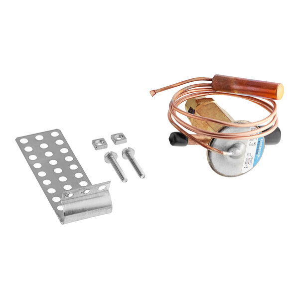 A close up of a Traulsen expansion valve with wires and a screw.