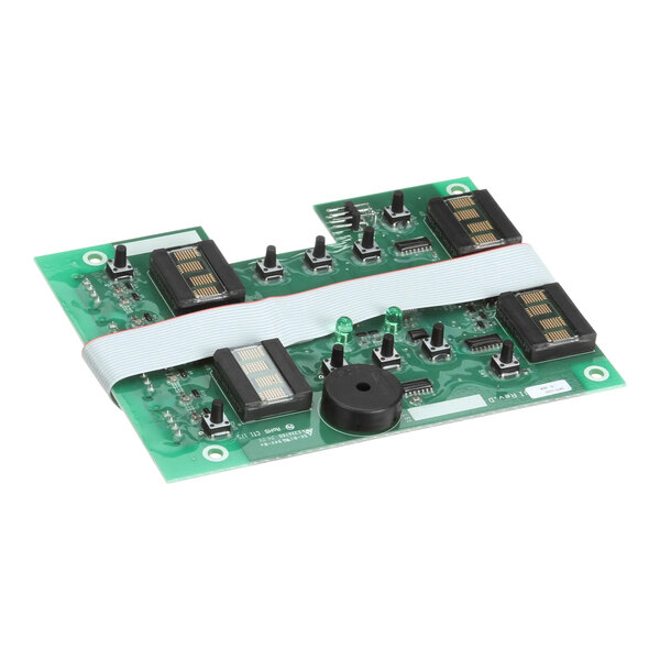 A close-up of a green Merco 340043 control board with black and white electronic components.