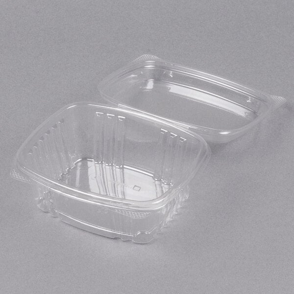 A Genpak clear plastic deli container with a high dome lid.