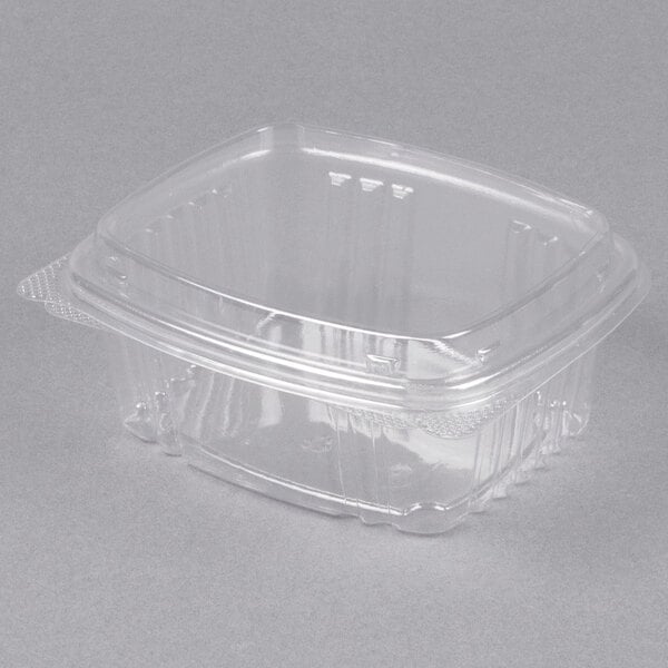 A clear plastic Genpak deli container with a high dome lid.