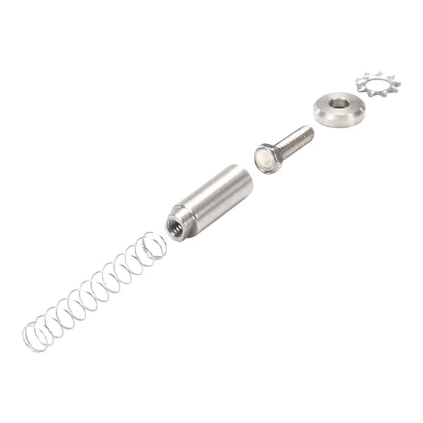 A close-up of a round silver metal screw with a hole in it.