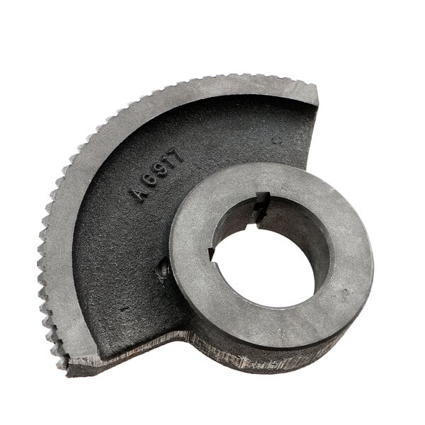 A Groen metal gear sector with a hole in it.