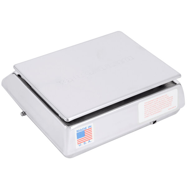 A silver rectangular box with a label for a Cardinal Detecto 6 lb. Digital All-Purpose Portion Control Scale.