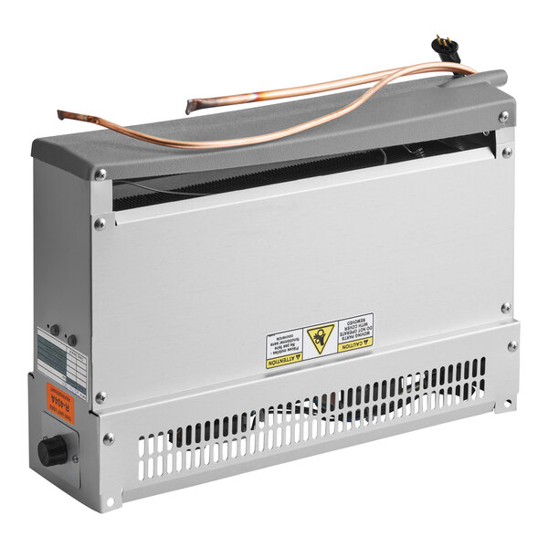 A rectangular metal device with vented panels, warning labels, copper tubing, and an electrical cord on top.