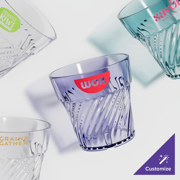 A close-up of a clear GET Tahiti plastic tumbler.