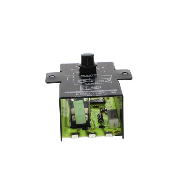 A black Grindmaster-Cecilware timer with a green cover and knob on a black background.