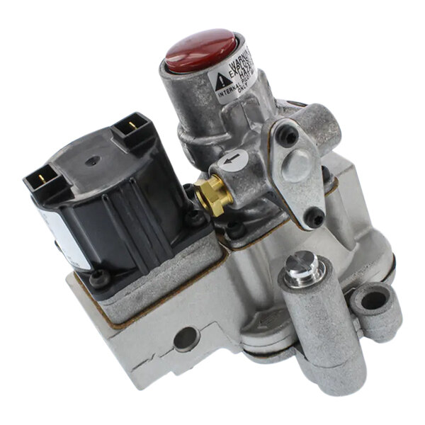 A close-up of a grey metal Basotrol valve with a black device and red button.