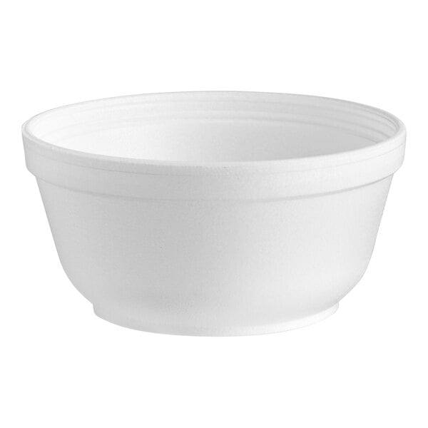 A close-up of a Dart white styrofoam bowl.