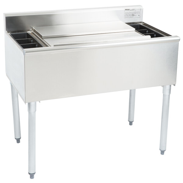 A stainless steel Eagle Group underbar cocktail and ice bin with bottle holders.