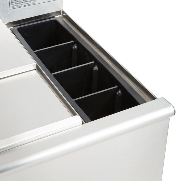 An Eagle Group underbar ice bin with bottle holders and an ice compartment.