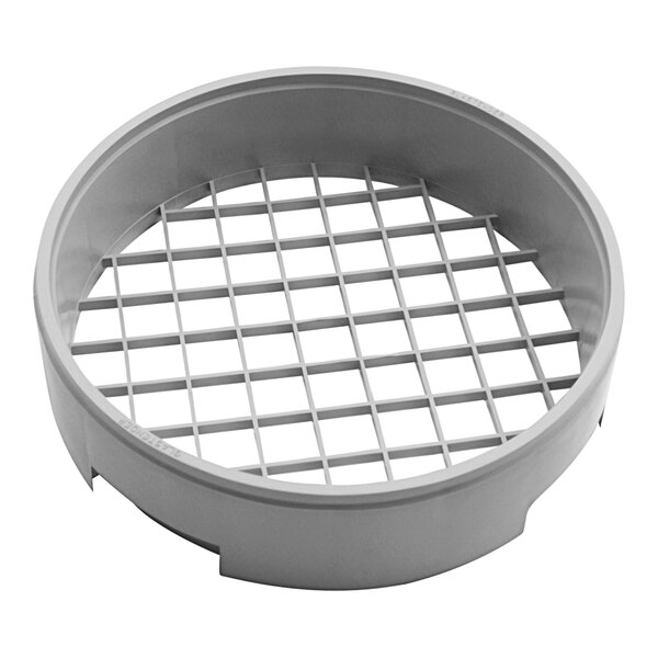 A grey metal circular grid with holes.