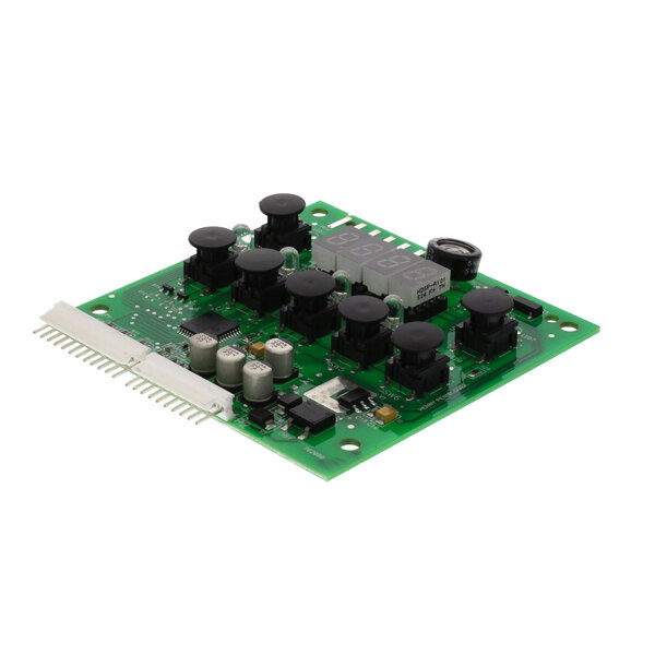 A close-up of a green Henny Penny 51102 circuit board with black buttons.