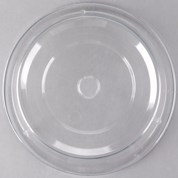 A clear plastic plate cover with a hole in the top.