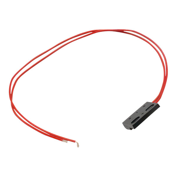 A black rectangular object with red, black, and white connectors.