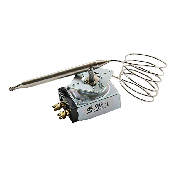 A Wilbur Curtis capillary thermostat with a metal rod.