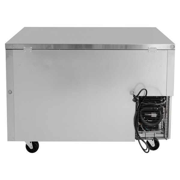 A stainless steel Turbo Air undercounter refrigerator with glass doors.