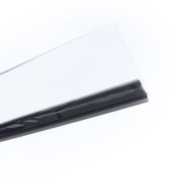 A close up of a black and white plastic sweep gasket.