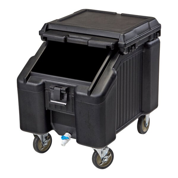 A black mobile ice bin with a sliding lid, spout, and four caster wheels.