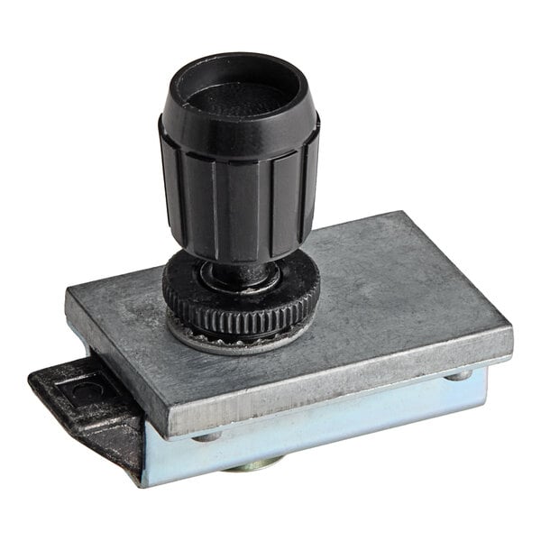 A metal rectangular latch with a black plastic quarter-turn knob on top.