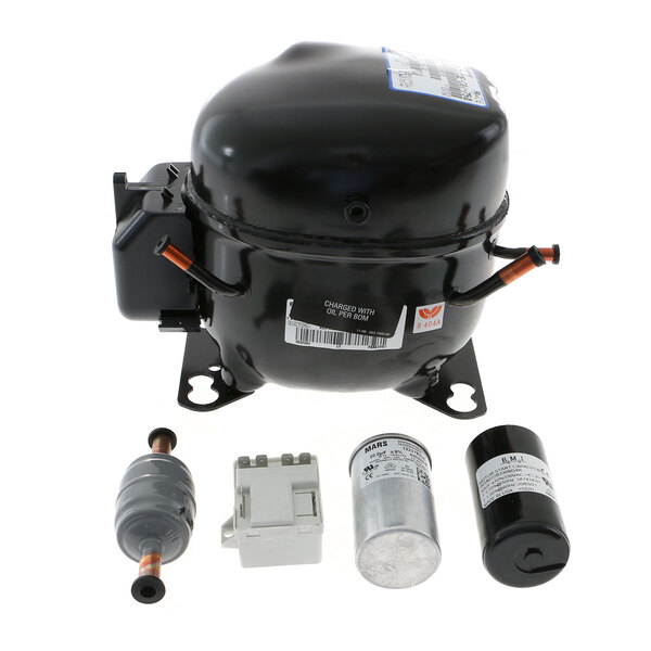 A Hoshizaki black refrigeration compressor with several parts.