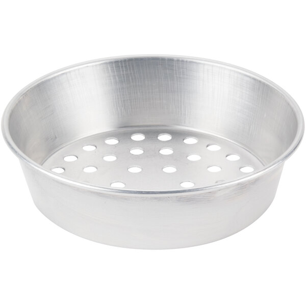 An American Metalcraft aluminum pizza pan with holes in it.