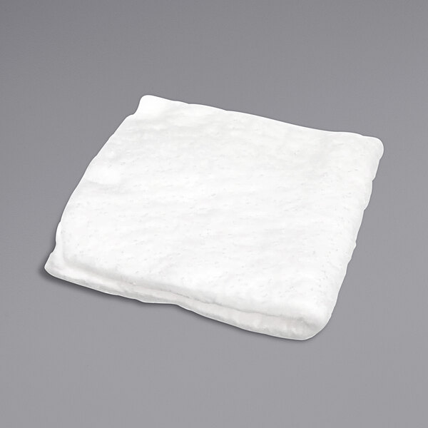 A white folded insulation blanket on a gray background.