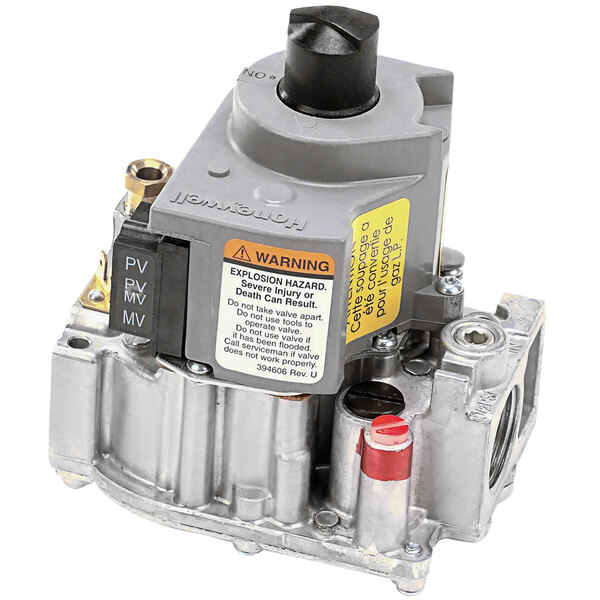 A grey metal Crown Steam gas control valve with a black and red button.