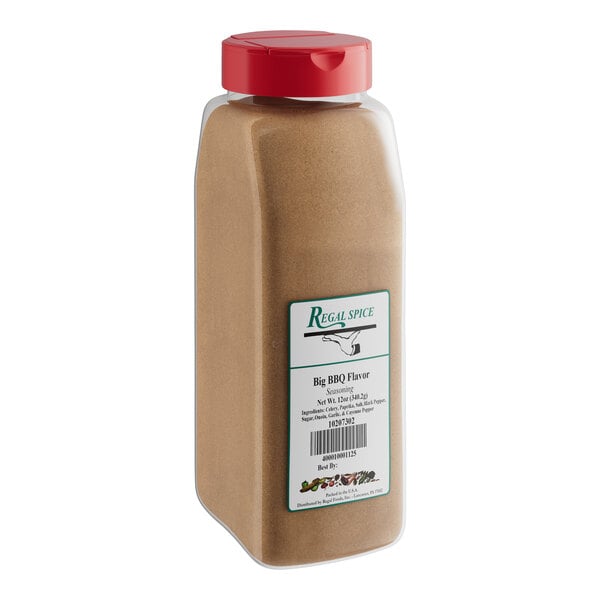 A brown plastic container of Regal Big Flavor BBQ Rub Seasoning with a red label.