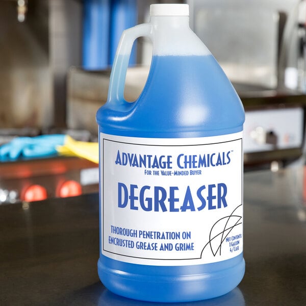 A case of 4 Advantage Chemicals 1 gallon degreaser bottles on a counter.