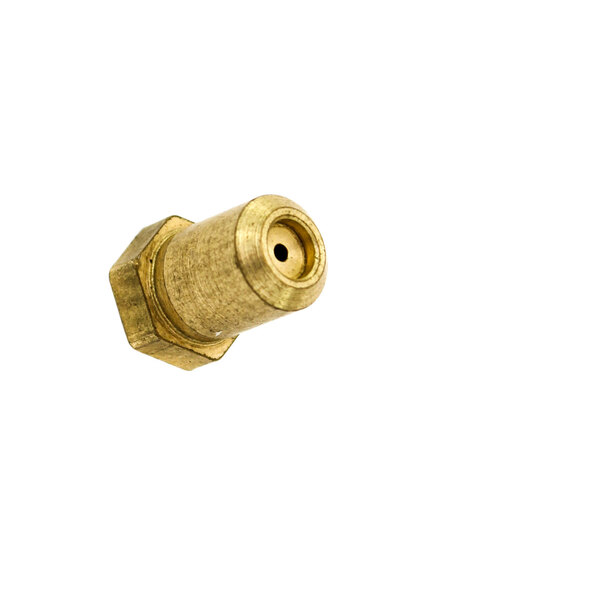 A close-up of a brass nut with a hole in it.