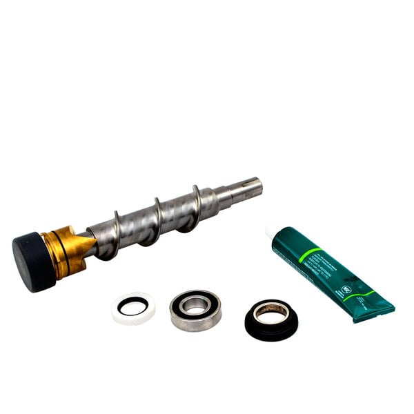 A Scotsman auger kit with a metal and plastic tube and a screw.
