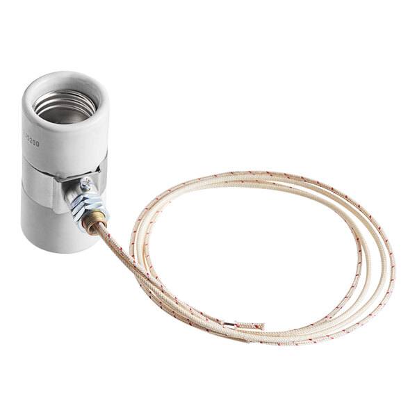 A white Hatco double socket pipe with wires attached.