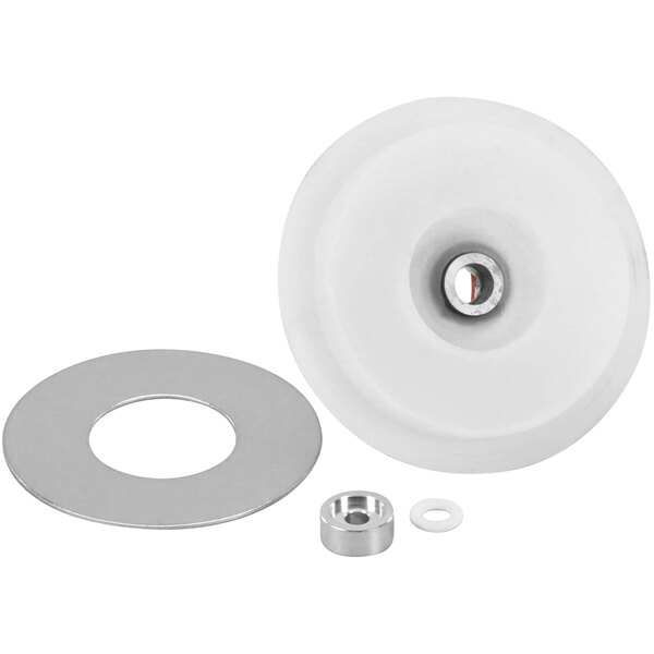 A white wheel with a silver circle with a hole in it.