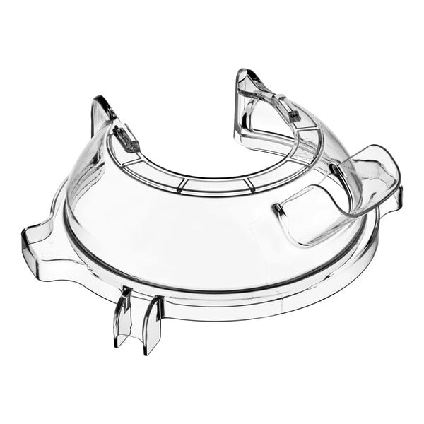 A transparent, dome-shaped plastic guard with an open center and several protruding tabs or clips around the edge.