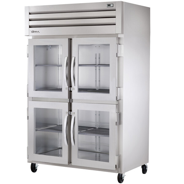 a large refrigerator with glass doors