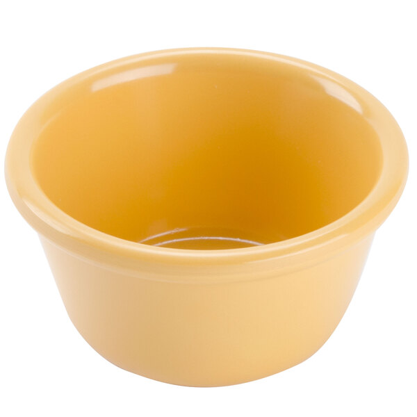 a close up of a yellow bowl