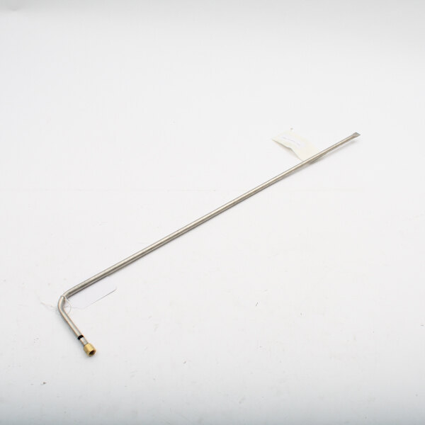 A metal rod with a white label.