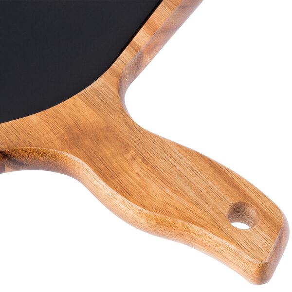 A Tablecraft rectangular acacia wood underliner with a removable black silicone liner.