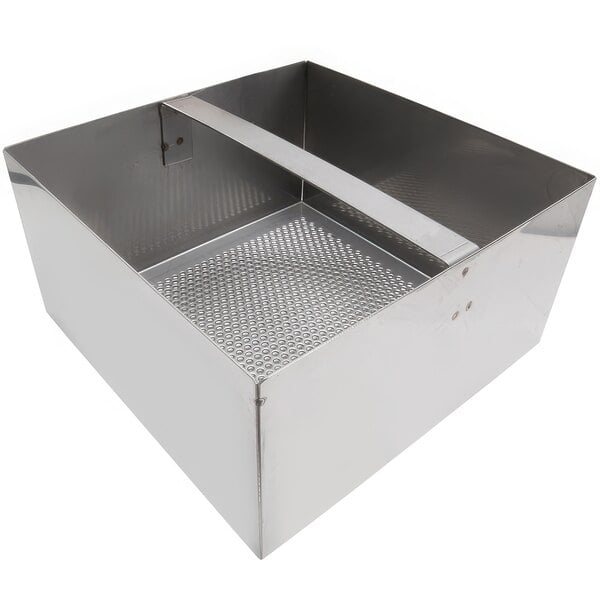 A stainless steel floor sink strainer with a metal grate with holes.