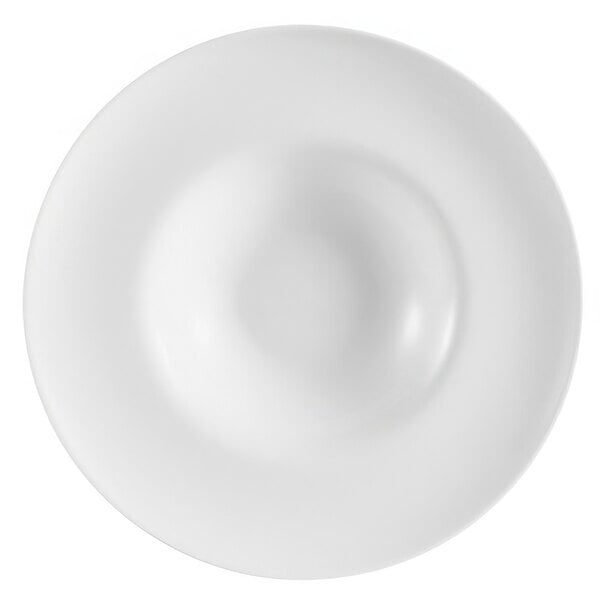 A white bowl with a circle in the middle.